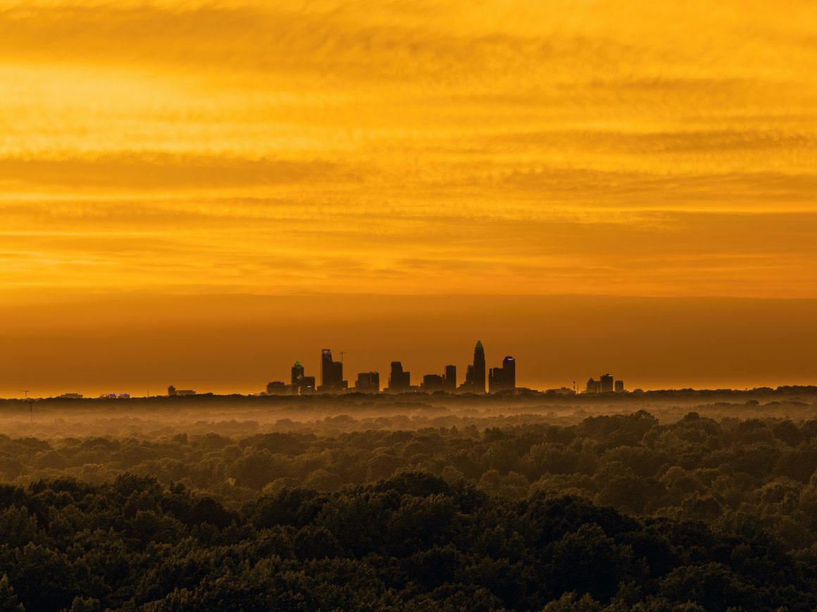 Orange Sunset Uptown from Matthews Charlotte NC taken by 5and2 Project
