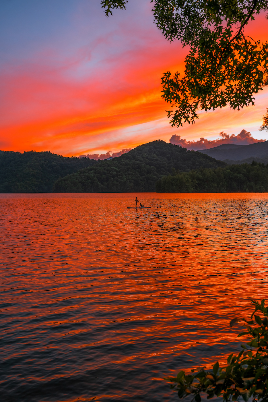 Paddleboarder at sunset taken by Sarah Leek - One of the best photographers in North Carolina