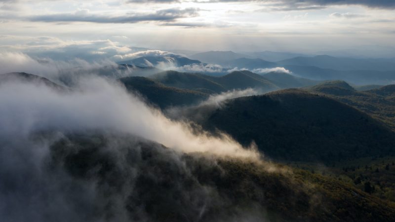 clouds over balsam Knob show beauty and importance of blue ridge conservancy
