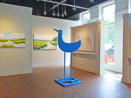 art installation featuring a blue bird at stain gallery