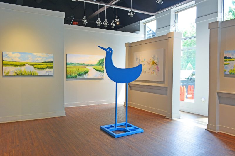 art installation featuring a blue bird at stain gallery