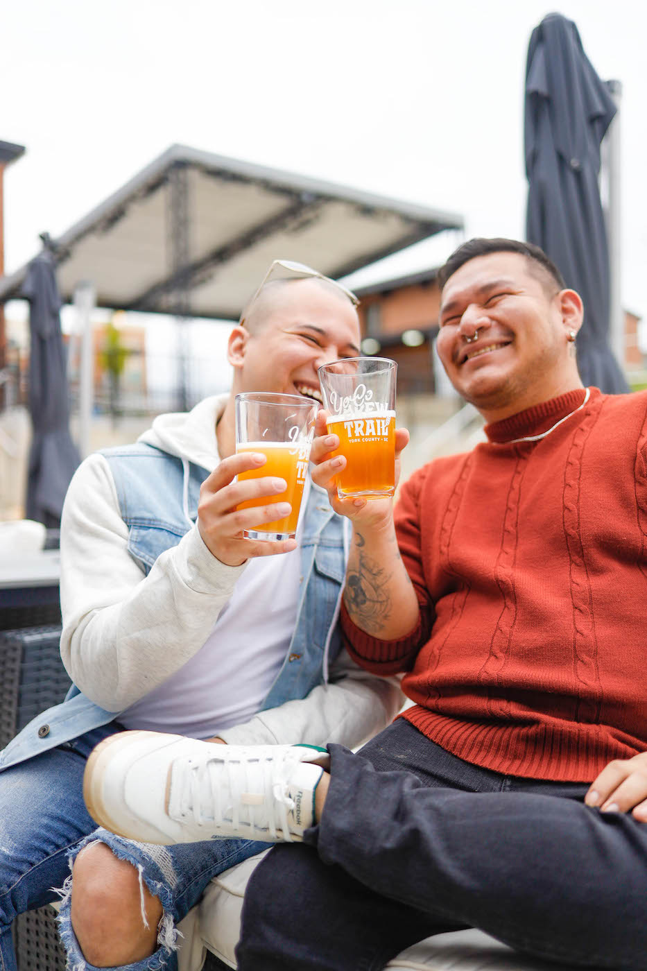 two people drinking beer