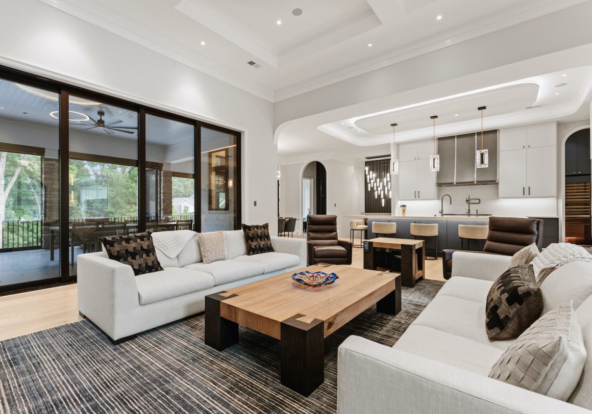 custom living room with a glass wall