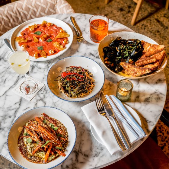 table full of food at henrietta's in charlotte