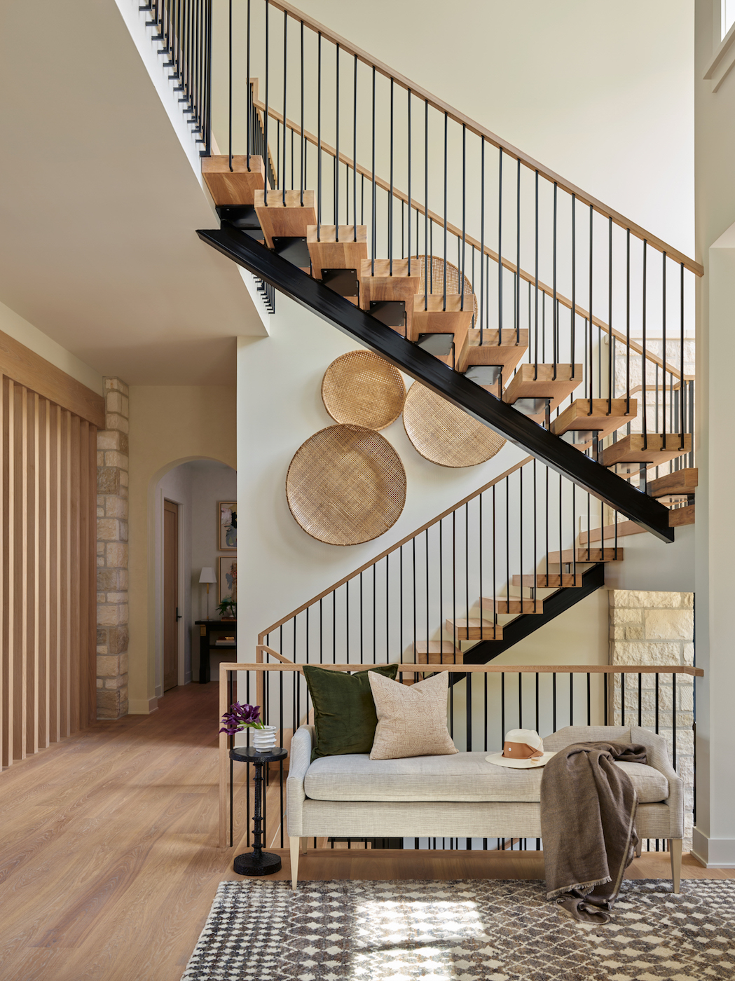 staircase and arched entryway