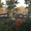 arch11 home tucked in the mountains during fall