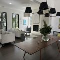adele dillon's art on display in a living room