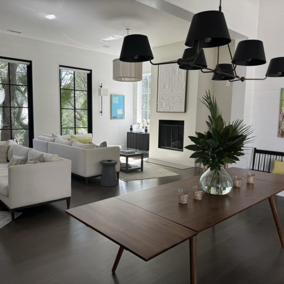 adele dillon's art on display in a living room