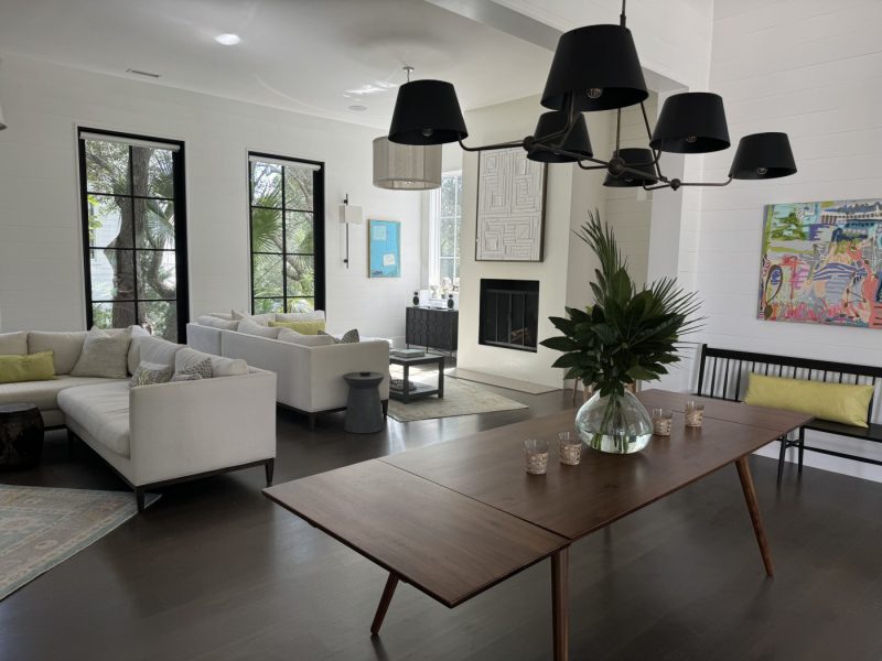 adele dillon's art on display in a living room