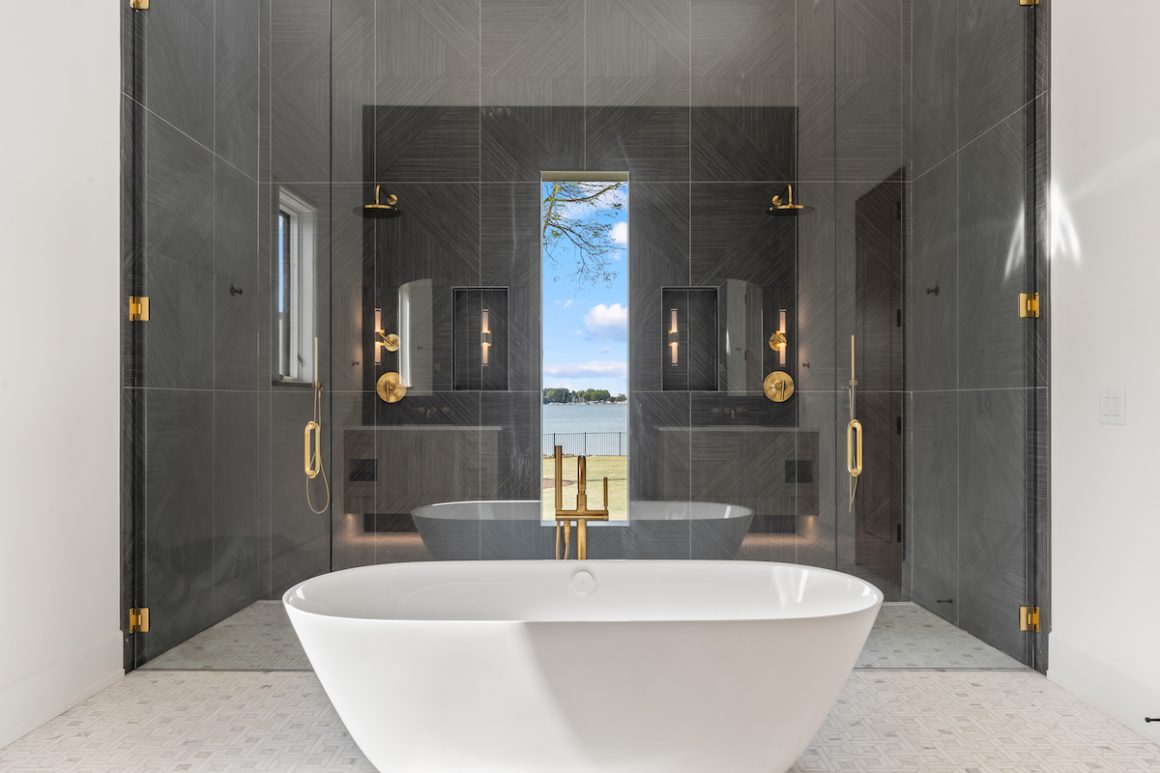 bathroom with a lake view